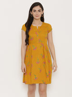 Short Block printed dress with front placket and side gathers in Mustard